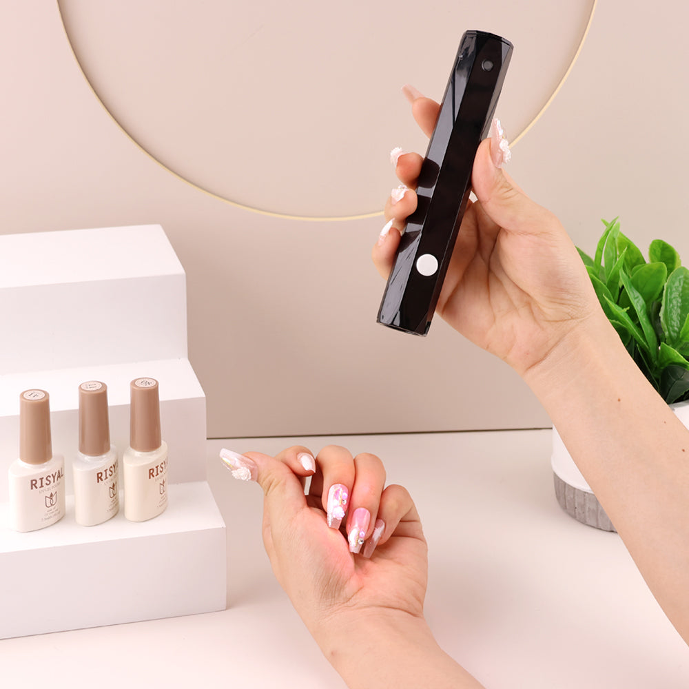 RNL012 85% Girls love this Mini rechargeable Cordless UV led soft gel finger tip flexible desk table nail lamp flash cure touch light